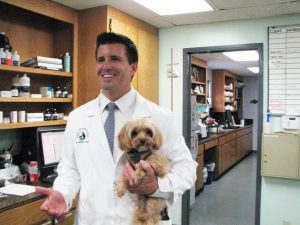 Veterinarian With Dog